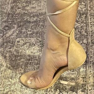 Selling, laced up never worn nude never worn, wedge, heal shoe.